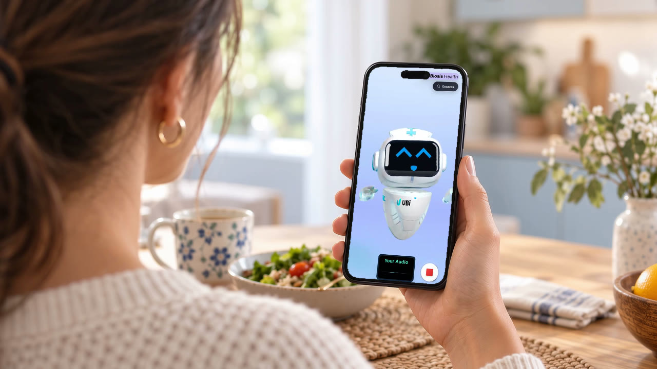 Over the patient's shoulder as she speaks with UBi in the app
